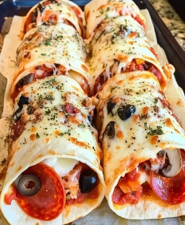 Baked pizza tortilla wraps filled with cheese and toppings