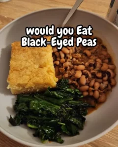 Dish of cooked black-eyed peas served with spices and herbs