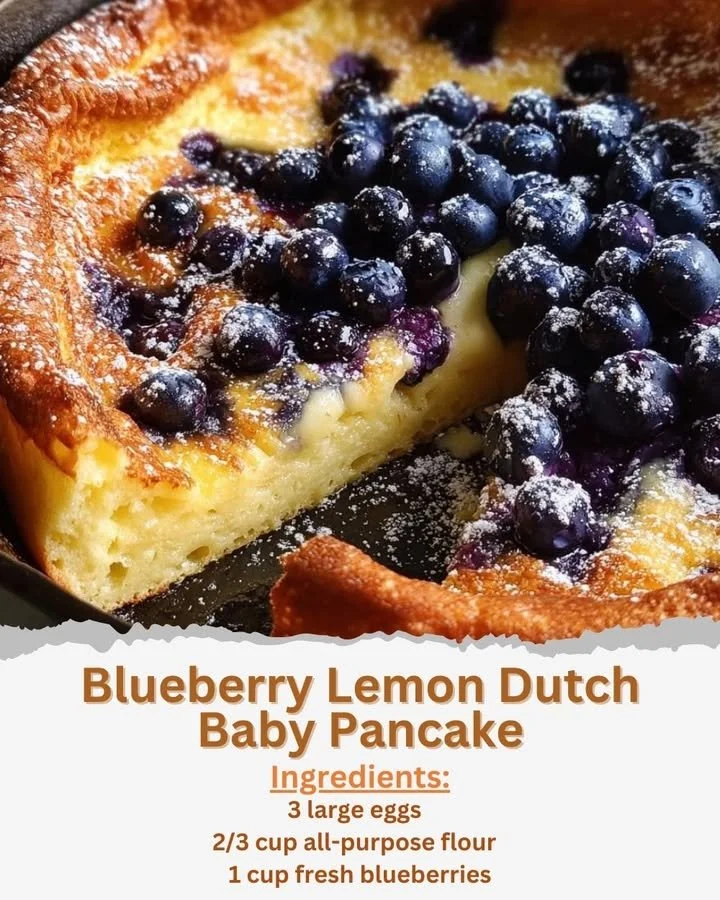 Fluffy Blueberry Lemon Dutch Baby Pancake served on a white plate