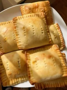 Homemade chicken pie fresh from the oven, garnished and ready to serve.