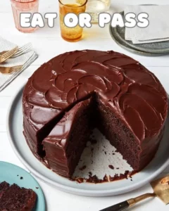 Delicious chocolate cake beautifully decorated with creamy frosting and sprinkles.