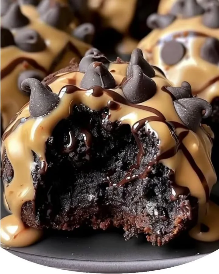 Chocolate chip cookie dough brownie bombs topped with gooey cookie dough.
