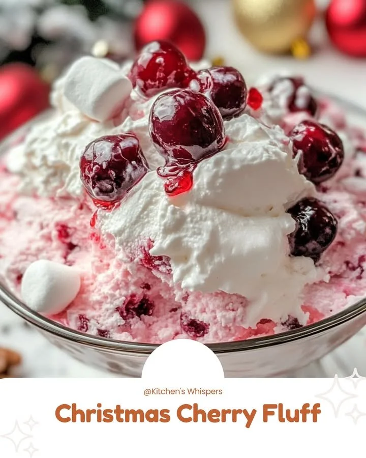 Festive Christmas Cherry Fluff dessert in a bowl topped with cherries