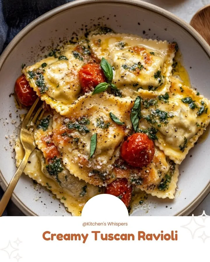 Creamy Tuscan ravioli with rich sauce and fresh herbs on a plate
