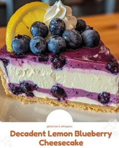 Deliciously decadent lemon blueberry cheesecake topped with fresh blueberries