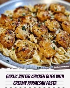 Delicious garlic butter chicken bites served with creamy parmesan pasta
