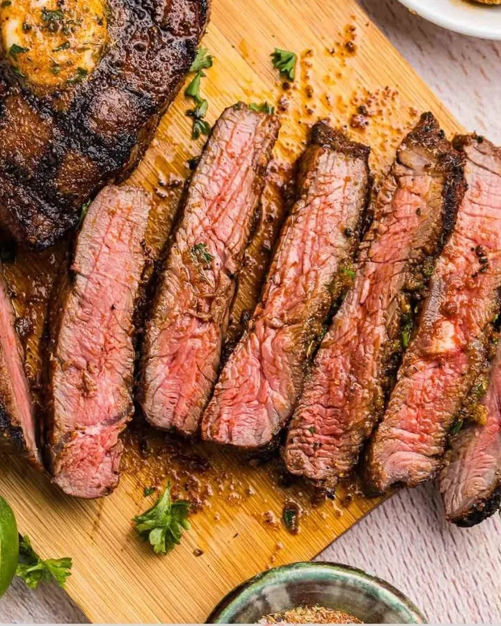 Grilled top sirloin steak with Cajun butter served on a plate