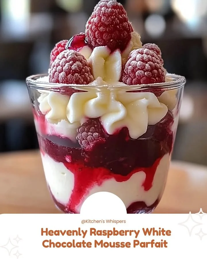 Heavenly raspberry white chocolate mousse parfait served in a glass.