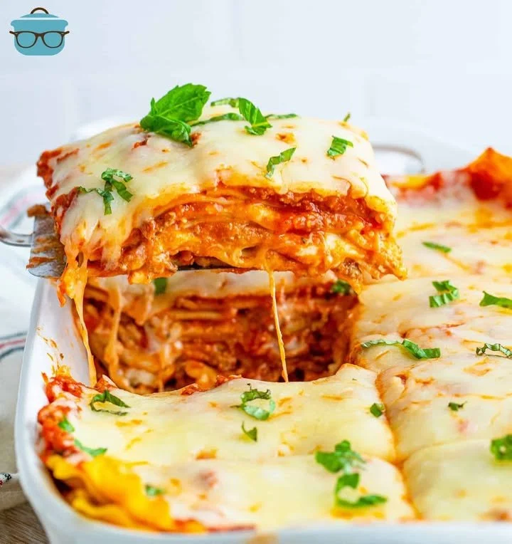 Delicious homemade baked lasagna with layers of cheese, meat, and tomato sauce