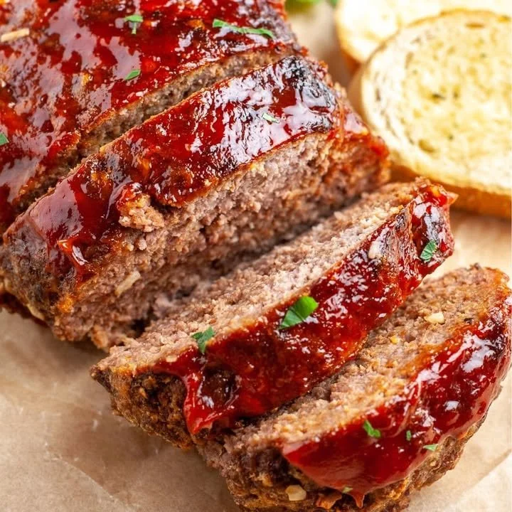 Delicious Lipton onion soup meatloaf served on a plate with garnish.