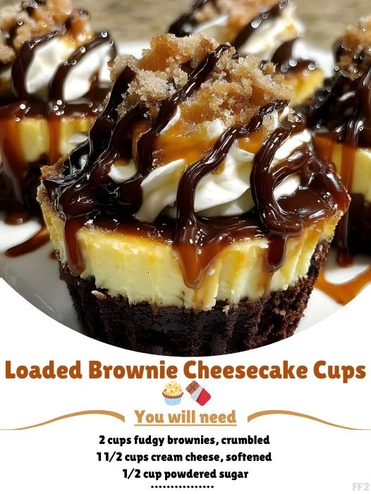 Loaded brownie cheesecake cups topped with chocolate drizzle and whipped cream