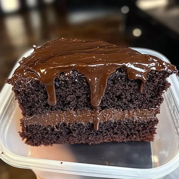 Moist chocolate cake with rich gooey chocolate glaze on top.