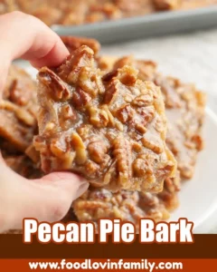 Delicious pecan pie bark with chocolate and pecan pieces on a rustic background