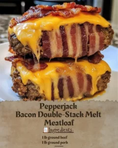 Pepperjack Bacon Double-Stack Melt Meatloaf served on a plate with garnishes.