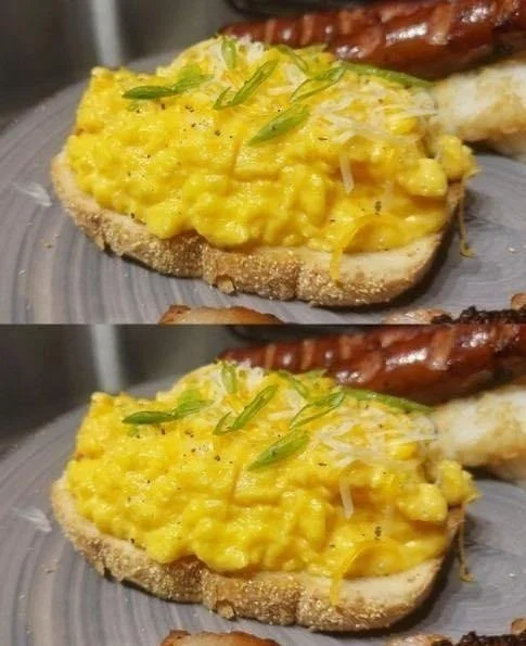 Delicious fluffy scrambled eggs served on a plate