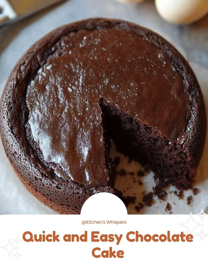 Delicious quick and easy chocolate cake topped with frosting and chocolate shavings