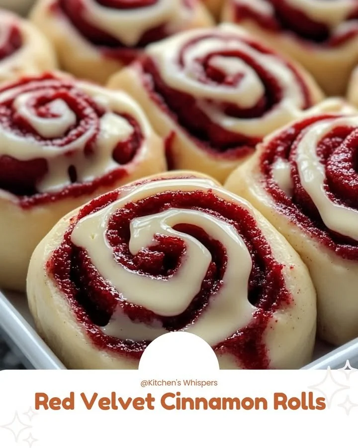 Delicious red velvet cinnamon rolls with cream cheese icing on a plate