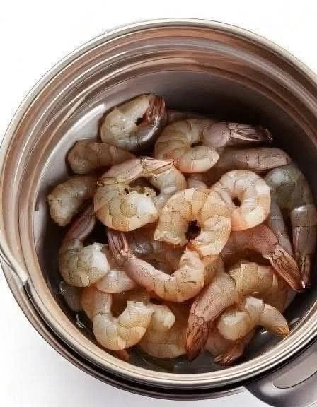Delicious slow cooker shrimp dish with vibrant herbs and spices