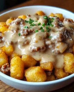 Tater Tot Breakfast Bowl with Sausage Gravy, a delicious morning meal.