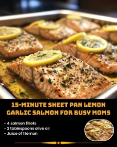 Sheet pan lemon garlic salmon cooked with fresh vegetables and herbs