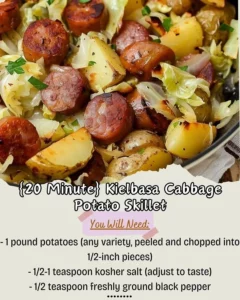 Kielbasa skillet with cabbage and potatoes cooking in a skillet