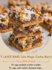 A tray of homemade 7 layer bars, also called magic cookie bars, showcasing their delicious layers.