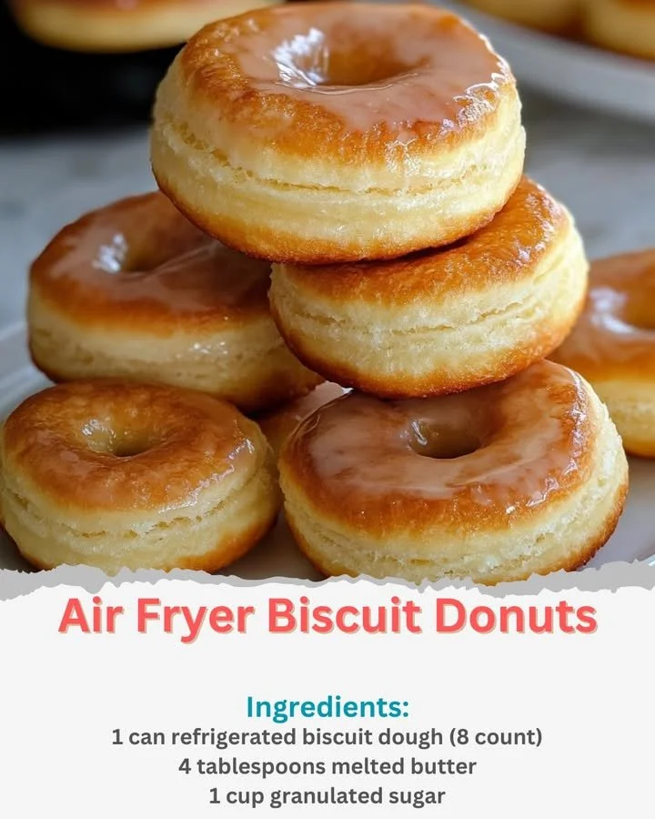 Delicious air fryer biscuit donuts ready to enjoy, golden and fluffy.