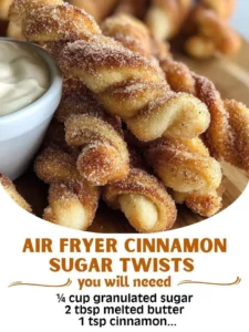 Air fryer cinnamon sugar twists served with cream cheese dip on a plate
