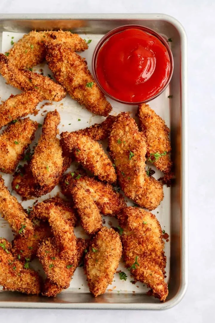 Crispy Air Fryer Panko Chicken Tenders served with dipping sauce