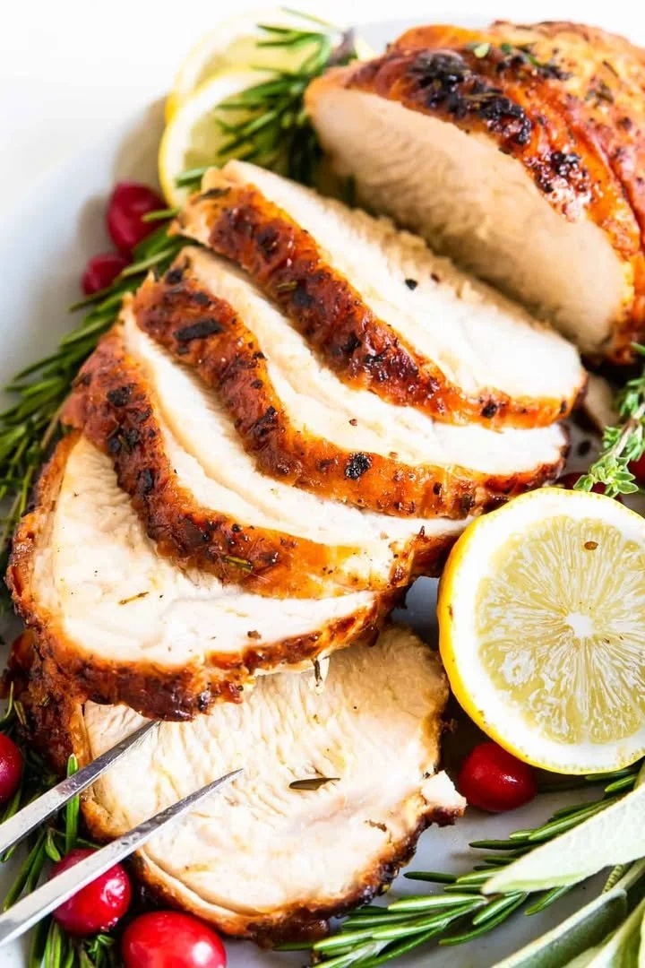 Crispy air fryer turkey breast served on a plate with side dishes