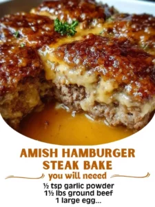 Amish Hamburger Steak Bake topped with savory gravy and served with vegetables
