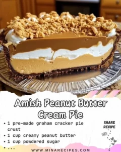 Slice of Amish Peanut Butter Cream Pie topped with whipped cream