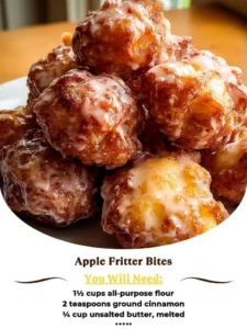 Plate of delicious Apple Fritter Bites, golden and crispy with apple chunks.