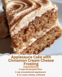 Sliced Applesauce Cake with Cinnamon Cream Cheese Frosting on a plate