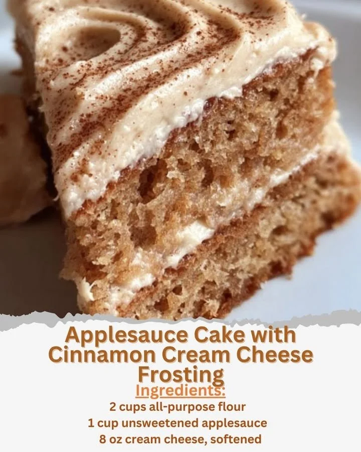Sliced Applesauce Cake with Cinnamon Cream Cheese Frosting on a plate