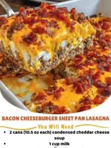 Sheet pan bacon cheeseburger lasagna served with cheese and bacon layers