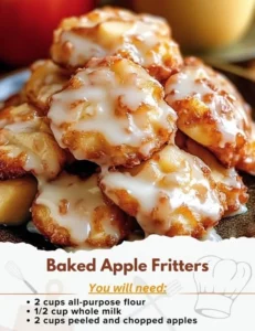 Baked apple fritters topped with powdered sugar on a white plate