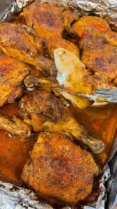 Perfectly baked chicken seasoned to perfection, showcasing a golden-brown exterior.