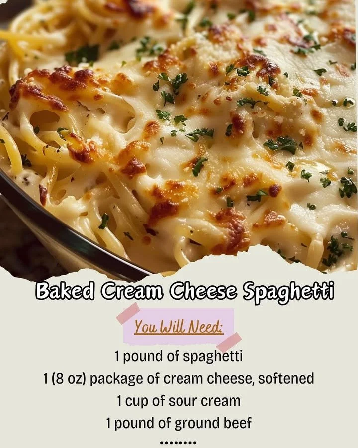 Baked cream cheese spaghetti served in a dish with herbs and cheese on top