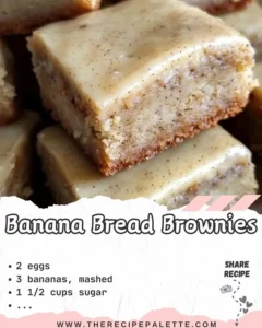 Decadent banana bread brownies topped with walnuts and chocolate drizzle.