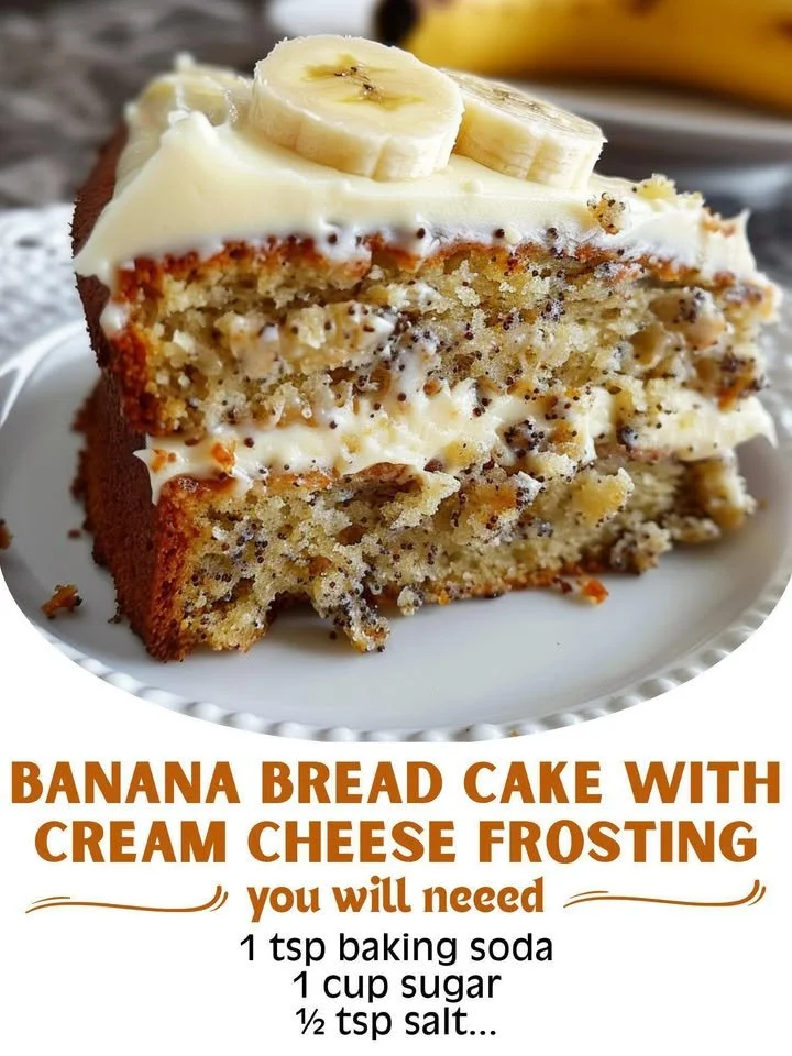 Banana bread cake topped with cream cheese frosting on a white plate