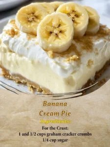 Delicious slice of Banana Cream Pie topped with whipped cream and banana slices