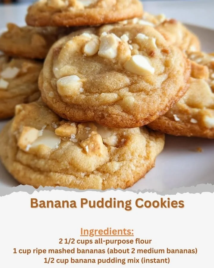 Freshly baked banana pudding cookies on a plate, drizzled with cream.