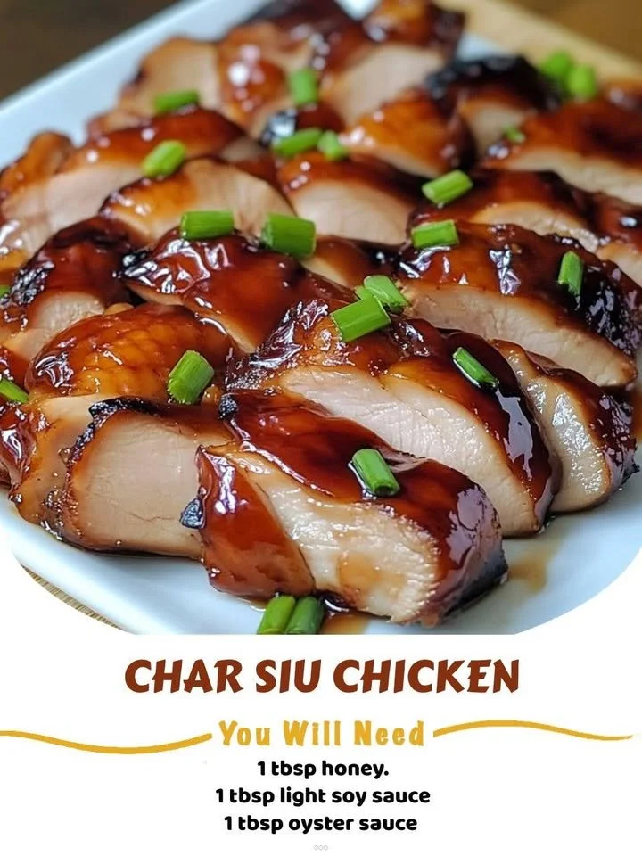 A delicious plate of barbecued pork chicken with vibrant sides and garnishes.