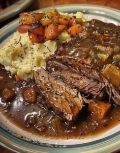 Delicious beef and gravy served over mashed potatoes