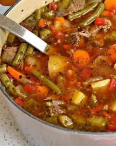 Bowl of hearty Beef Vegetable Soup with colorful vegetables and tender meat