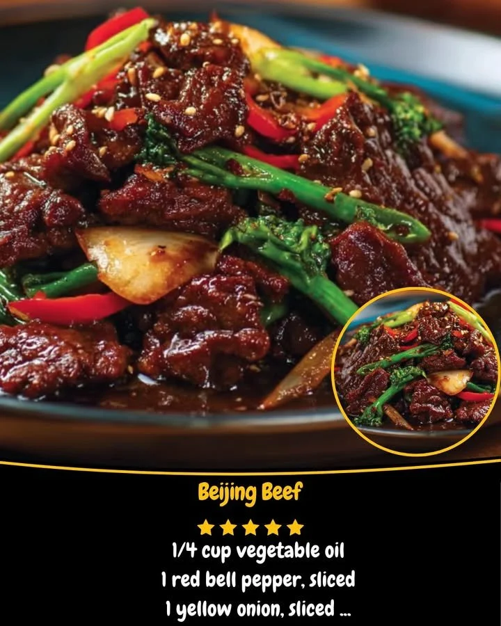 Plate of Beijing Beef with vegetables and sauce, showcasing a traditional Chinese dish.