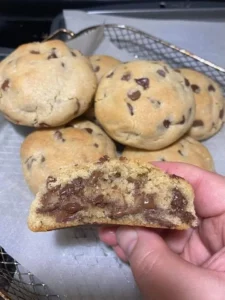 Freshly baked chocolate chip cookies with gooey chunks of chocolate