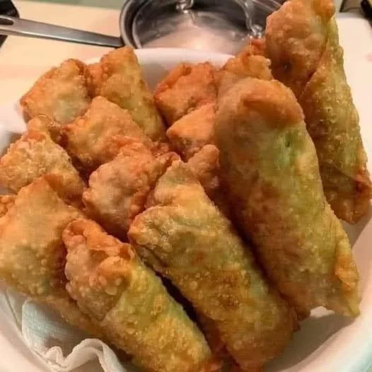 Plate of the best egg rolls with crispy wrappers and assorted fillings