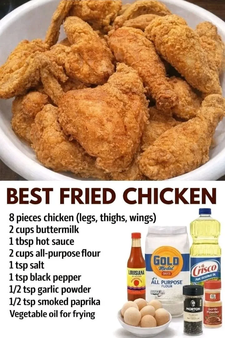 Plate of golden brown fried chicken served with sides